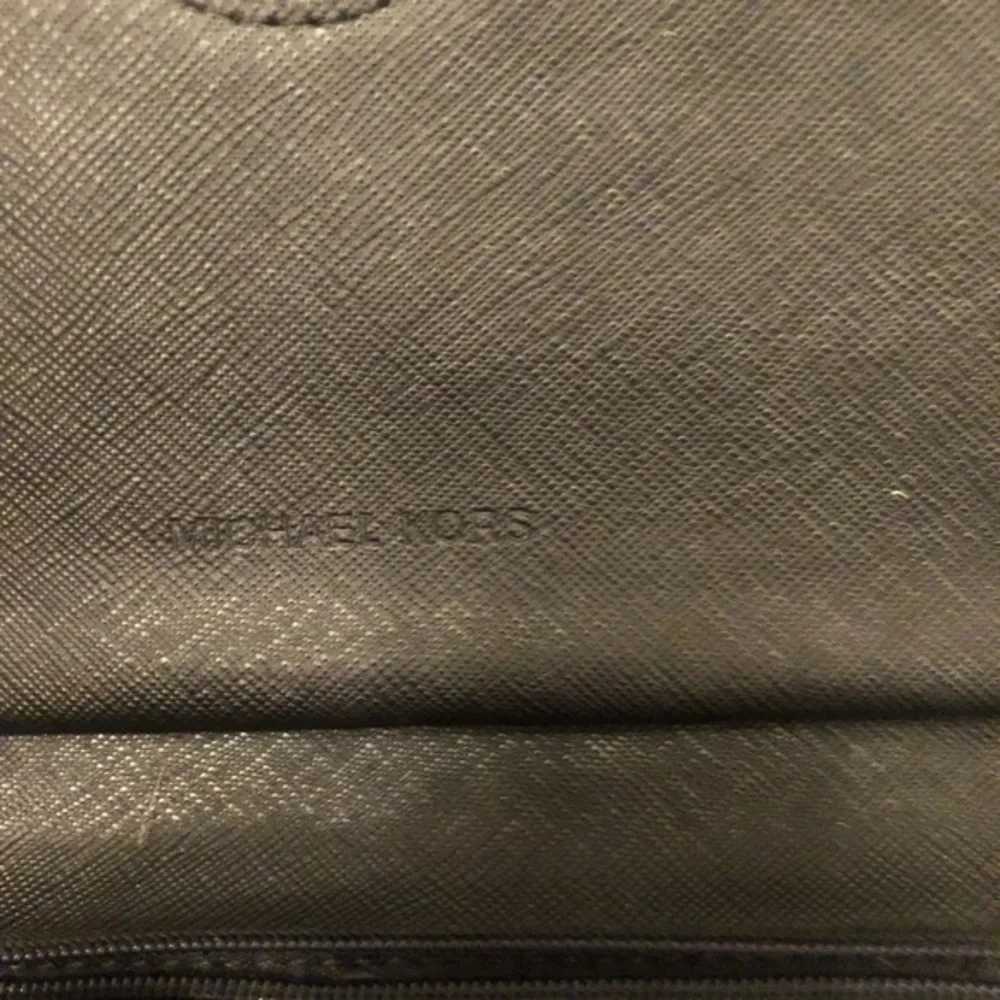 Michael kors black studded heart wristlet clutch